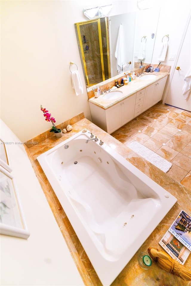 9595 Collins Ave Unit N9-C, Surfside, FL 33154 - full bathroom with a shower stall, double vanity, and a jetted tub