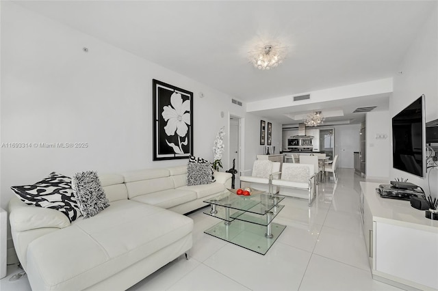 18201 Collins Ave Unit 1002, Sunny Isles Beach, FL 33160 - living room with light tile patterned flooring and a chandelier