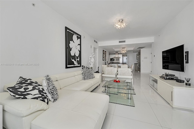 living room with light tile patterned floors