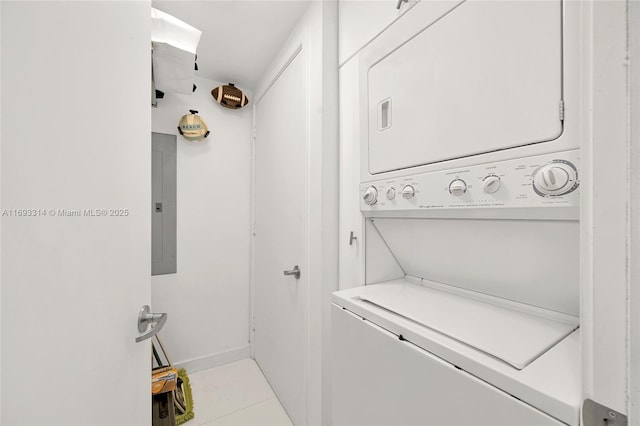 18201 Collins Ave Unit 1002, Sunny Isles Beach, FL 33160 - laundry area featuring stacked washer / dryer and electric panel