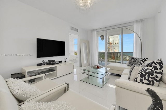 living room with tile patterned floors