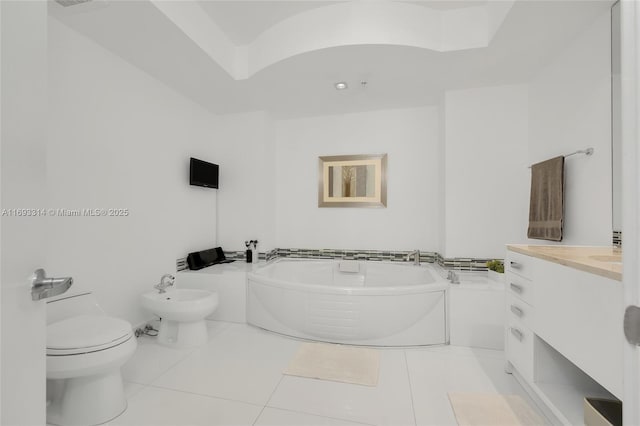 18201 Collins Ave Unit 1002, Sunny Isles Beach, FL 33160 - full bath featuring a bidet, a garden tub, vanity, and tile patterned flooring