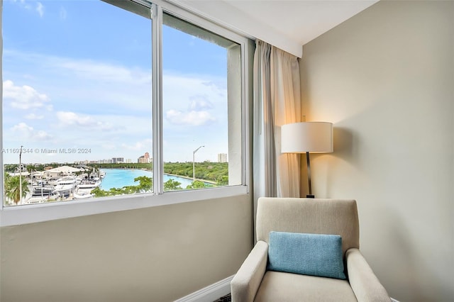 living area with a water view