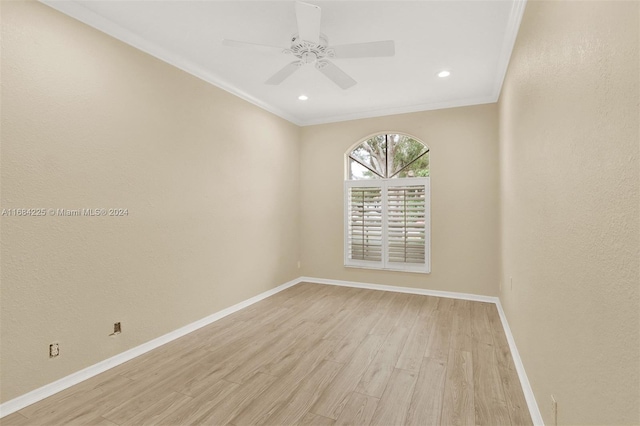 unfurnished room featuring ceiling fan, crown molding, and light hardwood / wood-style floors