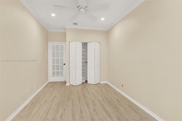 unfurnished bedroom with ceiling fan, light hardwood / wood-style floors, and ornamental molding