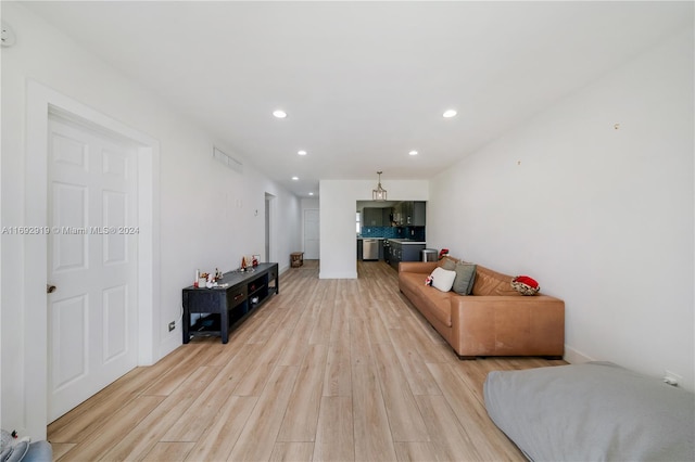 living room featuring light wood-type flooring