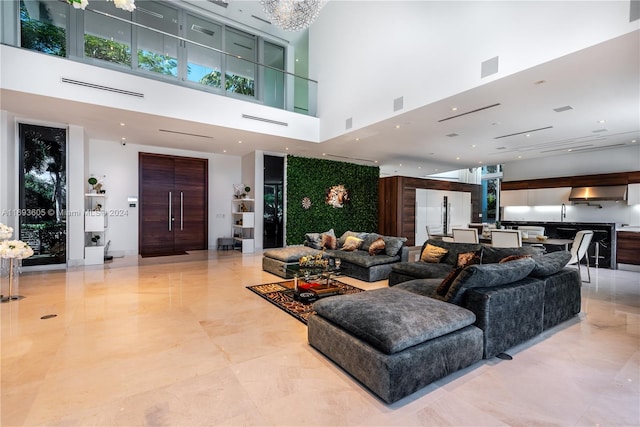 living room featuring a high ceiling