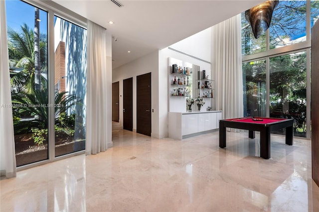 interior space featuring a wealth of natural light and billiards