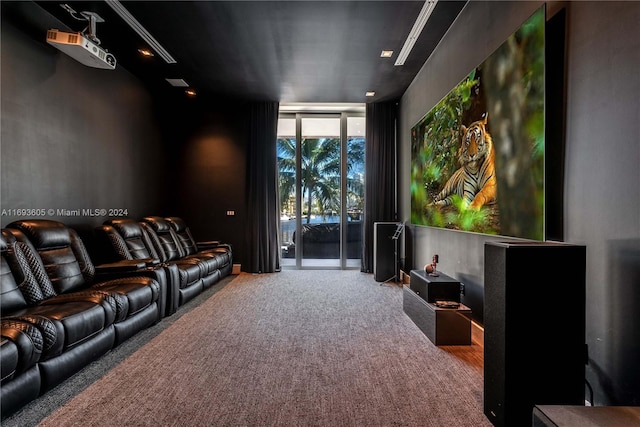 home theater room featuring carpet floors