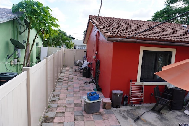 view of home's exterior with a patio area