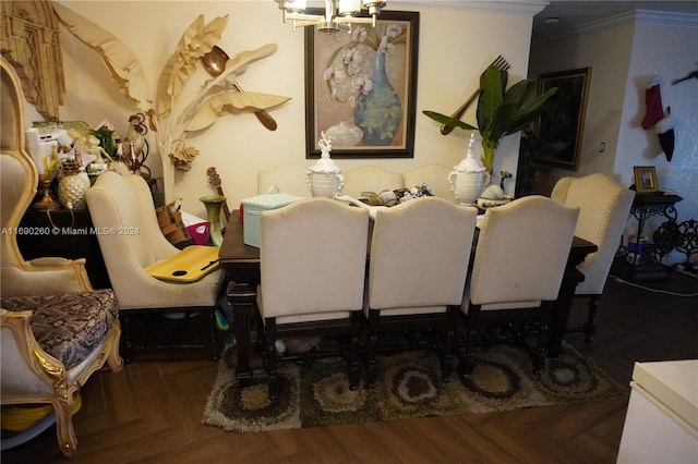 dining area with parquet floors, a notable chandelier, and crown molding