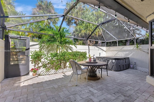 view of patio with a lanai