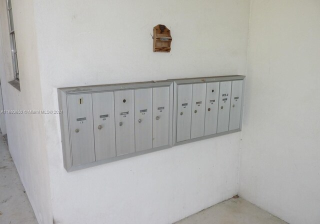 exterior details featuring mail boxes and concrete flooring