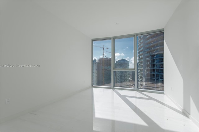 empty room with floor to ceiling windows