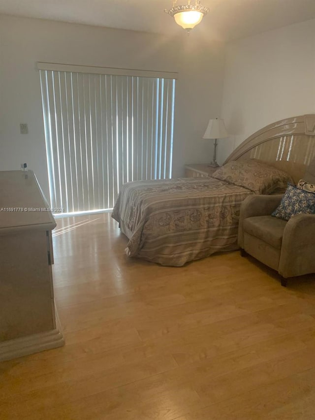 bedroom featuring light wood-type flooring