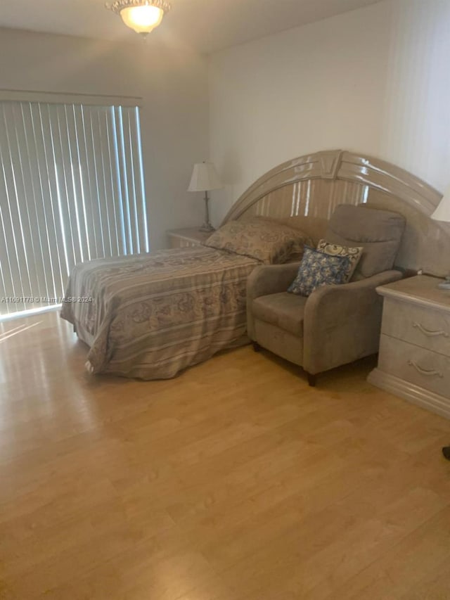 bedroom with light wood-type flooring