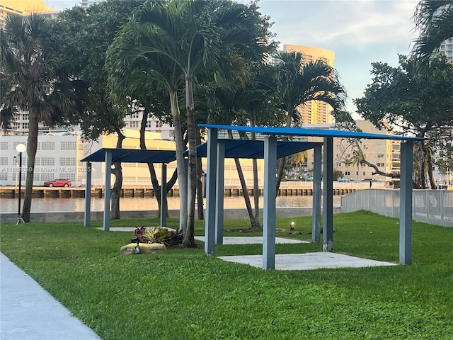 200 Leslie Dr Unit 324, Hallandale Beach, FL 33009 - view of community featuring a yard and a water view