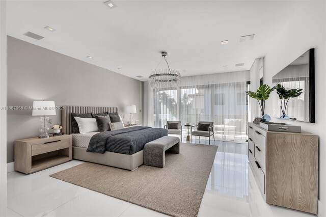 bedroom with a chandelier