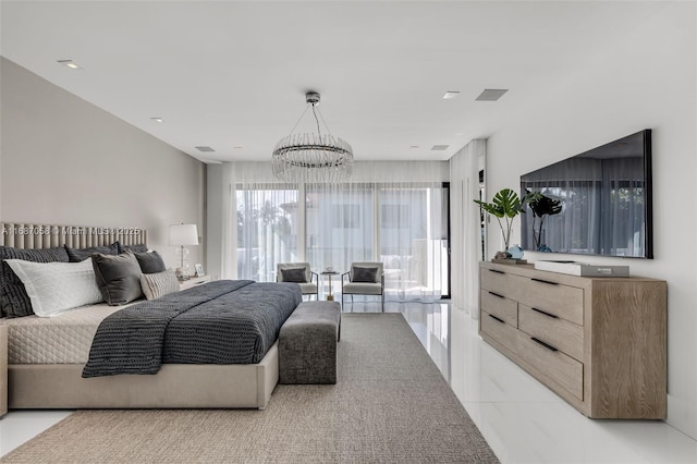 bedroom with a chandelier