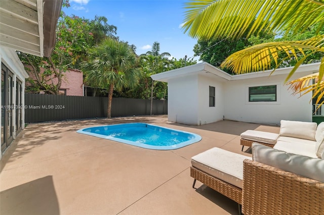 view of pool with a patio area