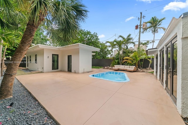 view of swimming pool featuring a patio area