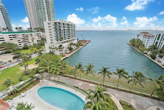 birds eye view of property featuring a water view