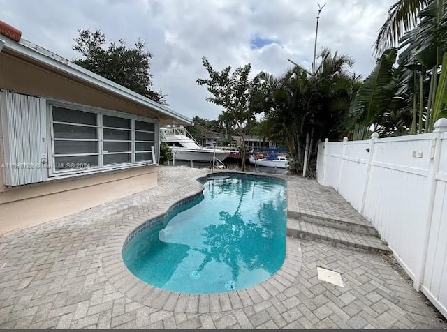 view of pool featuring a patio area