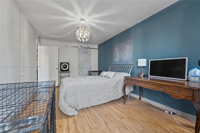 bedroom with hardwood / wood-style flooring