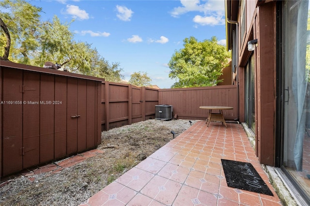 view of patio with central AC