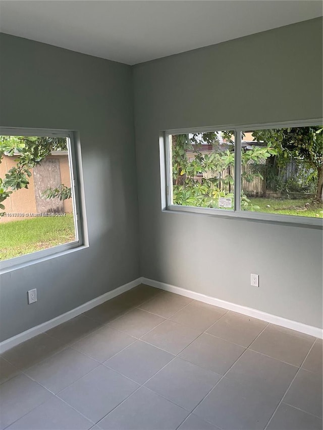 empty room featuring tile patterned floors