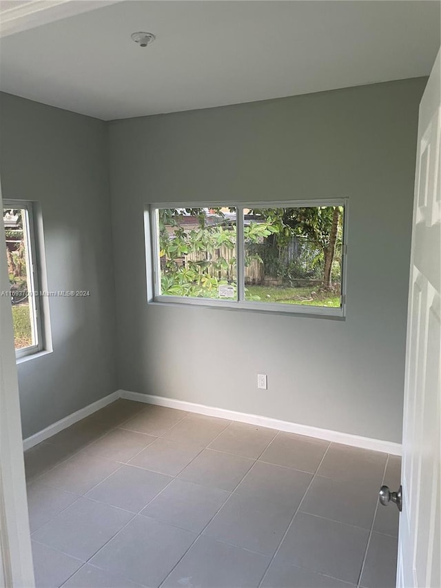 view of tiled empty room