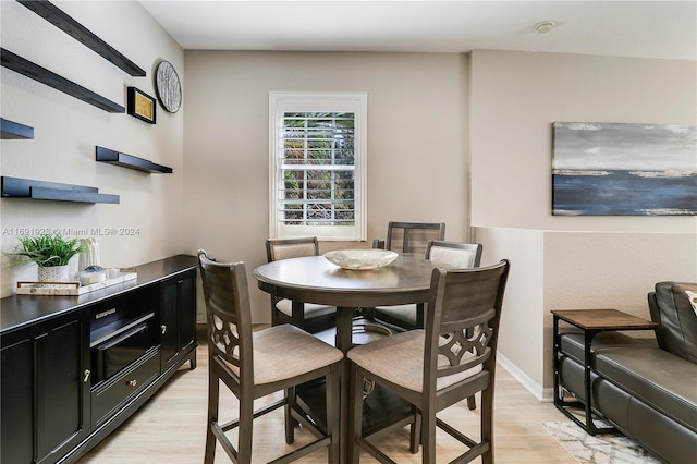 dining room featuring light wood-type flooring