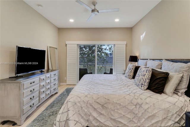 bedroom featuring access to outside, light hardwood / wood-style flooring, and ceiling fan