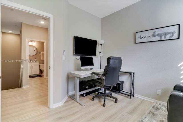 office space featuring light hardwood / wood-style flooring