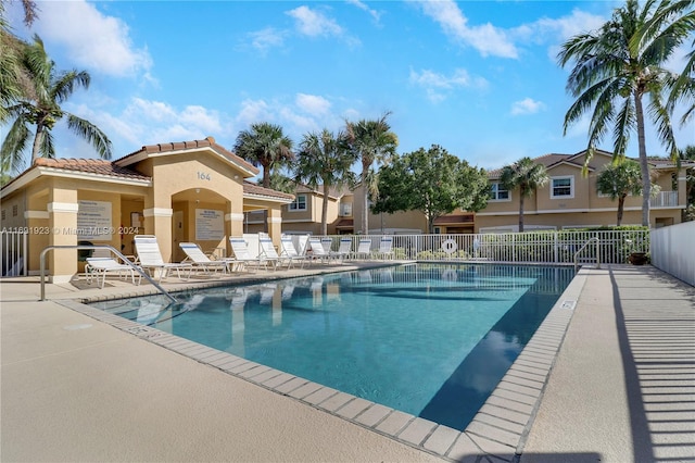 view of swimming pool with a patio area