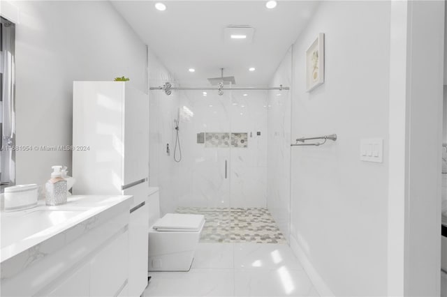 bathroom featuring vanity, an enclosed shower, and toilet