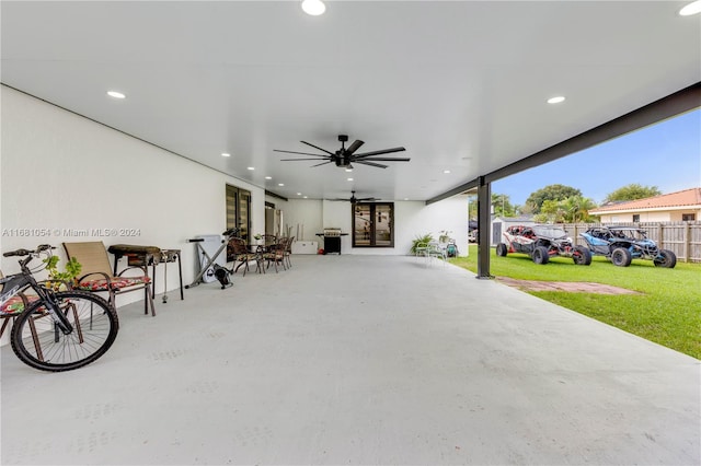 view of patio featuring ceiling fan and french doors