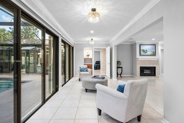 tiled living room with crown molding and a textured ceiling