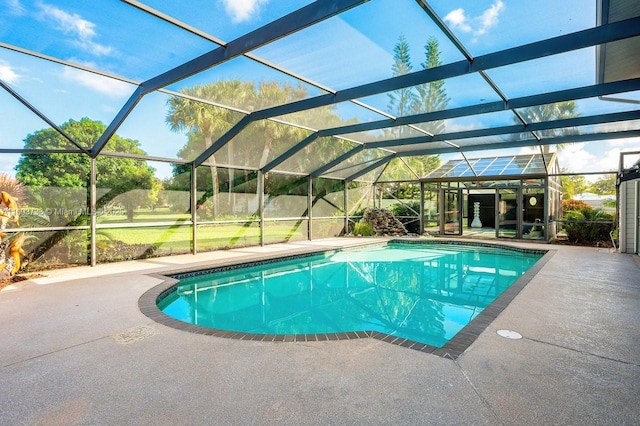 view of pool featuring a patio and a lanai