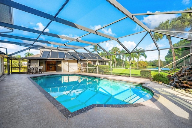 view of swimming pool with a bar, a lanai, and a patio area