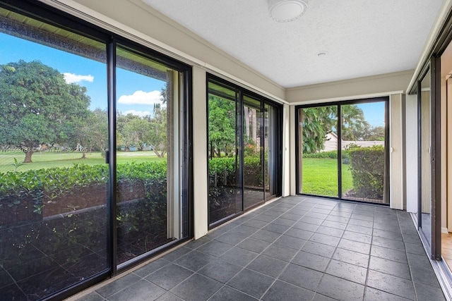 unfurnished sunroom with a healthy amount of sunlight