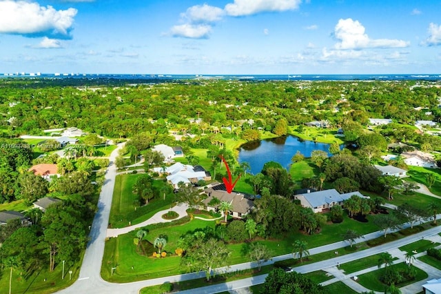 drone / aerial view featuring a water view