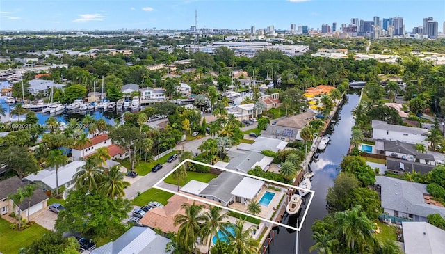 bird's eye view with a water view