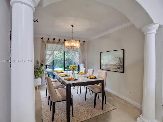 tiled dining room featuring crown molding and a chandelier