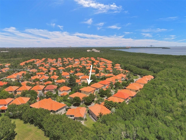 drone / aerial view with a water view