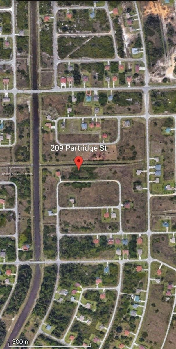 Listing photo 2 for 209 Partridge St, Lehigh Acres FL 33974