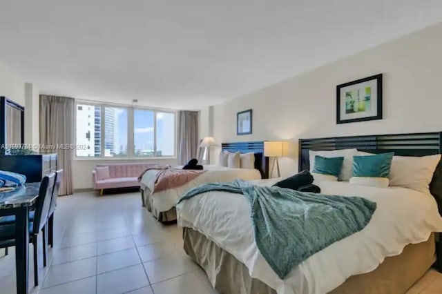 bedroom featuring tile patterned floors