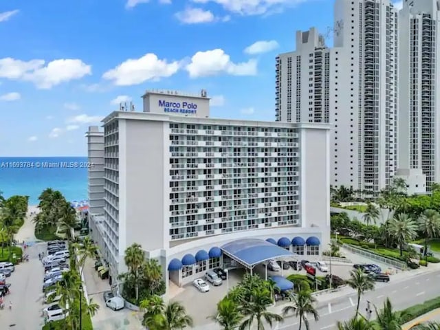 view of building exterior with a water view