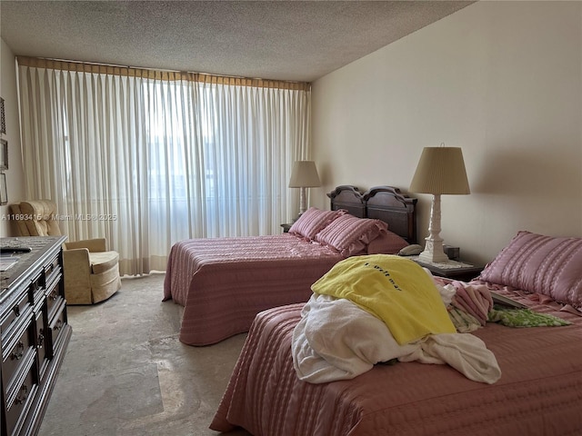 bedroom featuring a textured ceiling