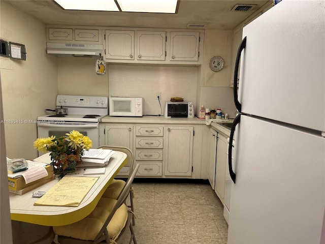 kitchen featuring white appliances